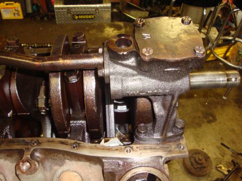 1989 Ford Bronco - Close-up view of an engine's oil pump and crankshaft assembly, showing internal mechanical components.