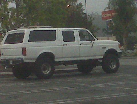1986 Ford Bronco - This lifted, four-door SUV is a 1992 Ford Bronco, not a 1986 model as claimed.