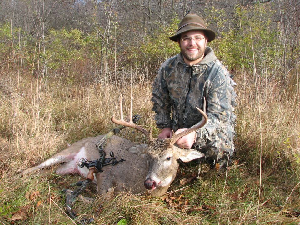 My first whitetail buck with my bow.  And he's not little, either!