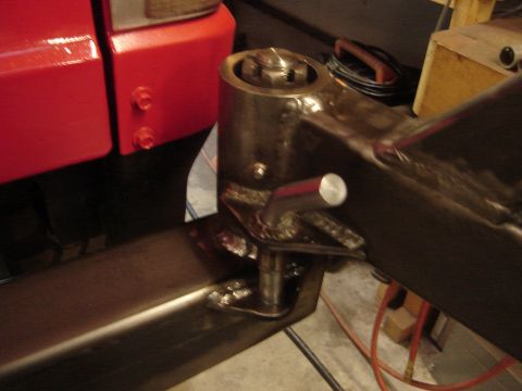 1989 Ford Bronco - Detail of a vehicle's frame and suspension components, likely during repair or modification.