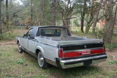 1972 Ford Ranchero - Custom pickup conversion based on a Lincoln Mark LT, seen from the rear 3/4 angle.