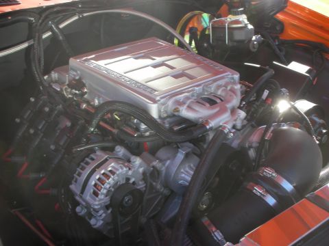 1998 Ford Crown Victoria - built engine featuring a polished finned intake manifold, alternator and braided lines in a custom engine bay.