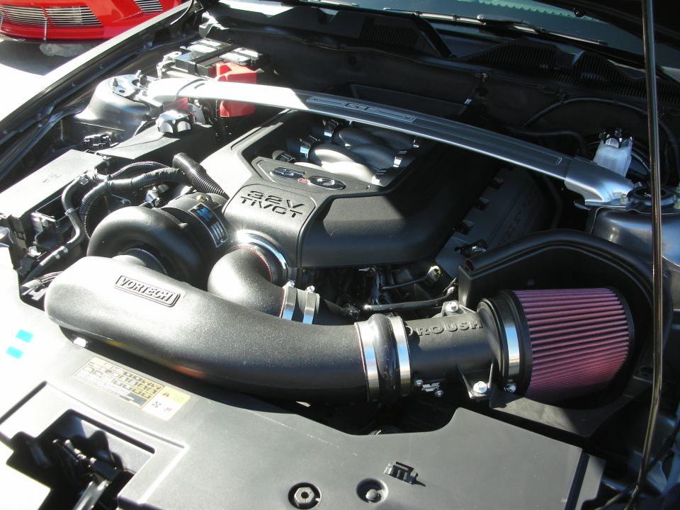 Mustang engine bay with 32V Ti-VCT cover and Roush Vortech supercharger intake