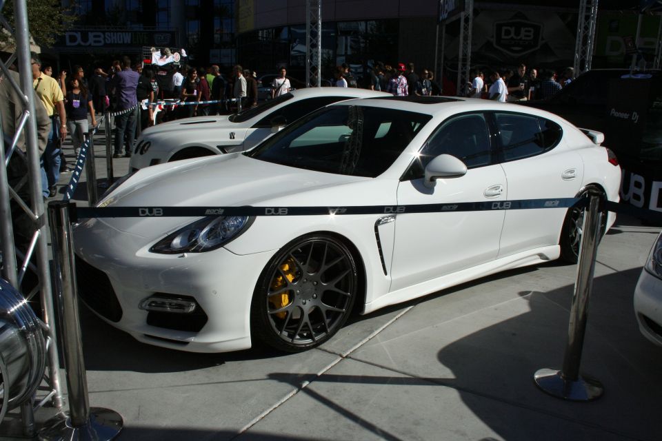 White Porsche Panamera with DUB graphics and yellow brake calipers
