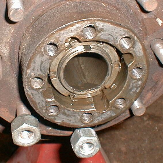 See the fingers next to the spindle nut?