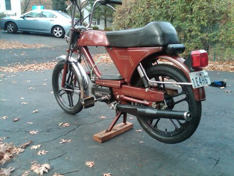 1981 Garelli Rally Sport - This moped has a black seat and exhaust pipe, with chrome fenders and handlebars.