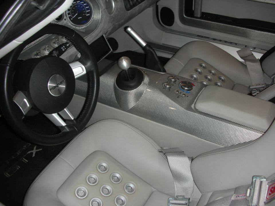 Light gray leather Ford GT interior with carbon-fiber console and shifter