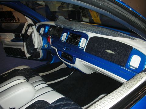 1998 Ford Crown Victoria - custom two-tone blue-and-white leather interior with quilted seats and a painted billet dashboard.
