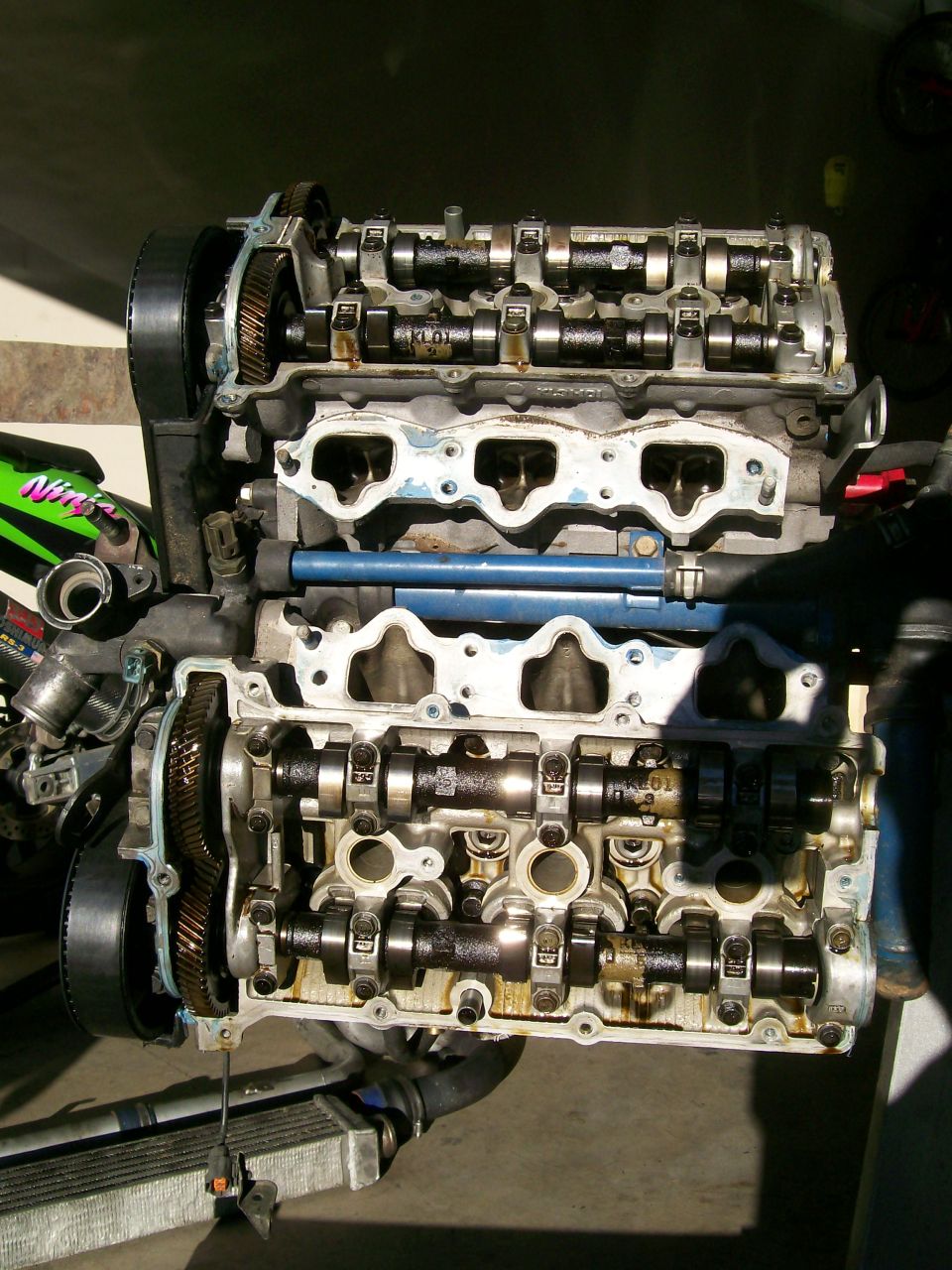 engine block with exposed camshafts and timing gears
