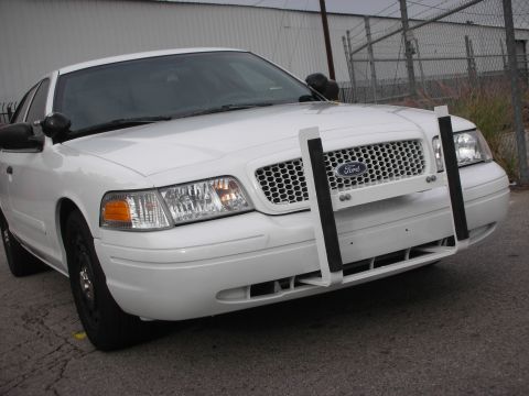 2004 Ford Crown Victoria - Front view of a white 2004 Ford Crown Victoria equipped with a push bumper.
