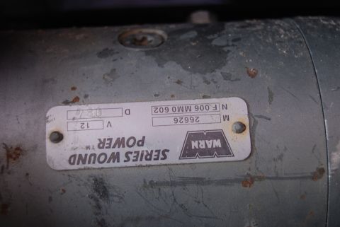 1982 Ford Bronco - Close-up of a Warn Series Wound Power winch motor, showing the model number and other identification details.
