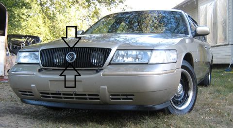 2000 Mercury Grand Marquis - Front view of a 2000 Mercury Grand Marquis, showing the grille and headlights.
