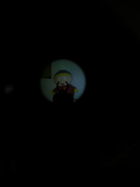 1996 Ford Bronco - A toy character is visible through a scope, with a red dot sight overlay.