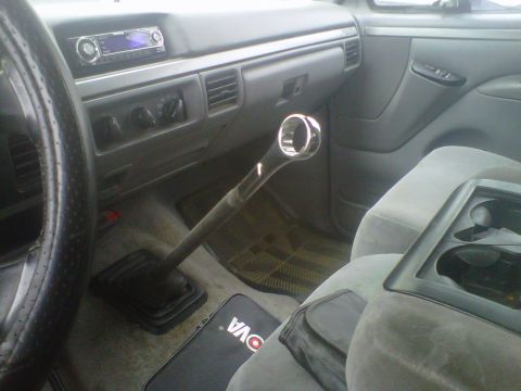 1994 Ford F-150 - The interior of a 1994 Ford F-150 pickup truck features a unique shift knob made from a large socket wrench.