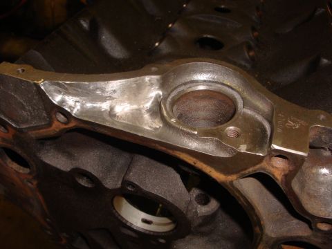 1989 Ford Bronco - A close-up view of a cleaned engine block casting, likely part of an automotive repair or restoration process.