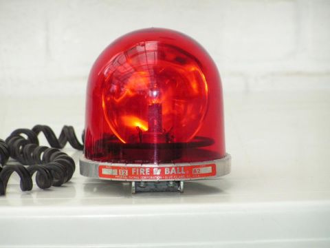 1991 Ford Crown Victoria - Federal Signal Fire Ball rotating beacon light, likely for emergency vehicles.