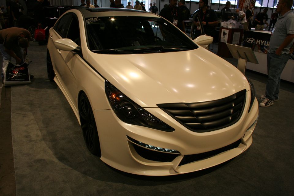 White Hyundai Sonata custom sedan front three-quarter at show