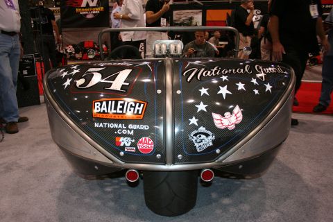 1998 Ford Crown Victoria - carbon-fiber rear deck of a custom show vehicle marked number 54 carries National Guard, Baileigh and K&N decals with white stars.