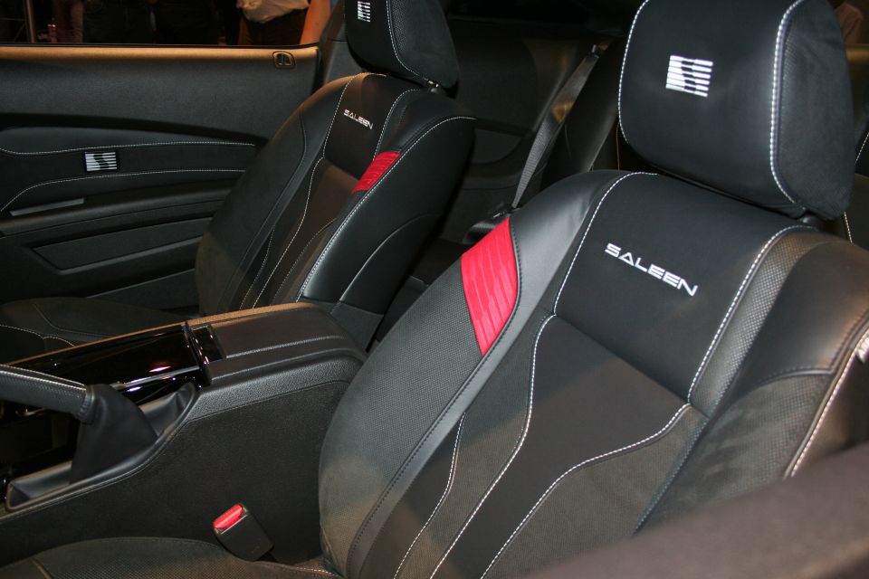 Black leather Saleen front seats with red accents and embroidered logos