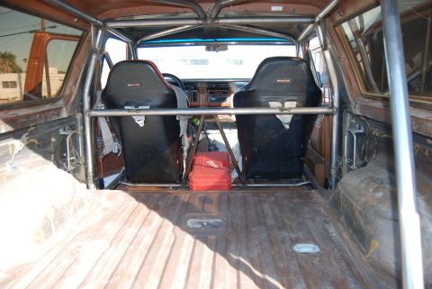 1982 Ford Bronco - The interior of this SUV has been outfitted with racing seats and a full roll cage for off-road use.