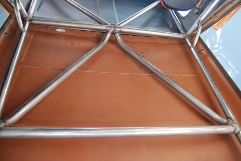 1982 Ford Bronco - A custom roll cage is installed within the vehicle's interior.