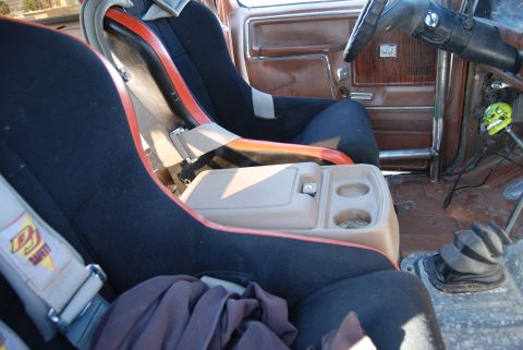 1982 Ford Bronco - Interior view of a 1982 Ford Bronco, racing seats and a roll cage.