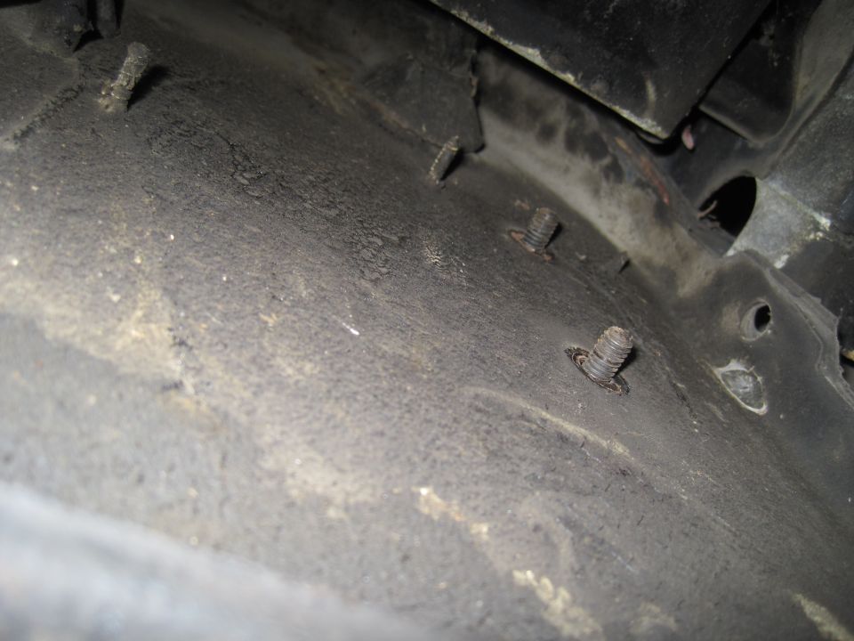underside of vehicle showing bolts and frame