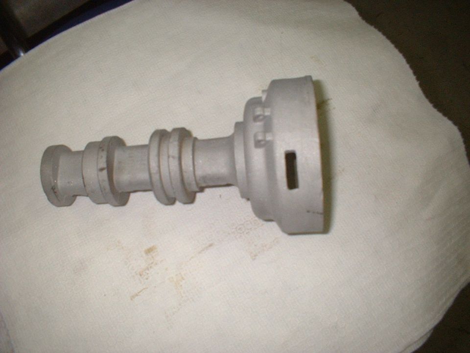 All the guts removed & the vacuum advance mounting boss cut away. Slot will be filled with alum-poxy, sanded & then housing will be finish coated. Will mount a Pertronix module & an original type cap & it will look very close to a HiPo distributor at a substantial  lower cost.