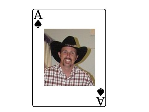 1986 Ford Bronco - A playing card features a man's portrait, superimposed over the Ace of Spades.