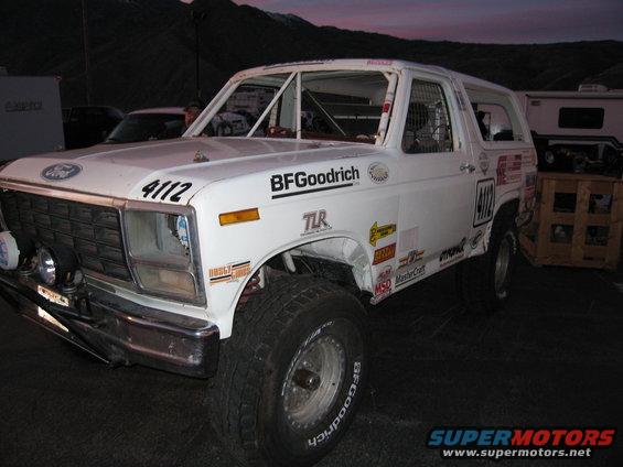 White 1986 Ford Bronco front view with BFGoodrich tires and racing decals