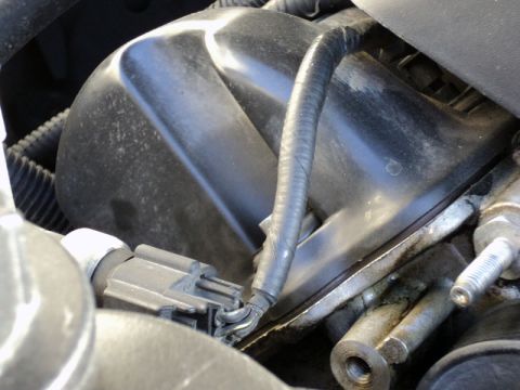 2001 Mercury Grand Marquis - Engine component detail with visible wiring and connector.