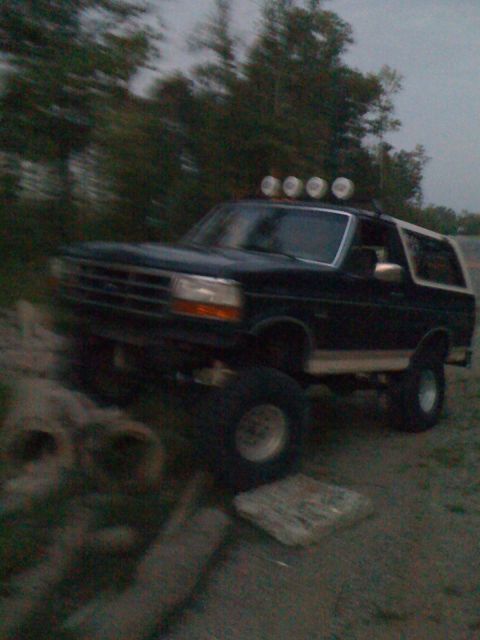 1992 Ford Bronco - This 1992 Ford Bronco is equipped for off-roading with large tires and auxiliary lights on the roof rack.