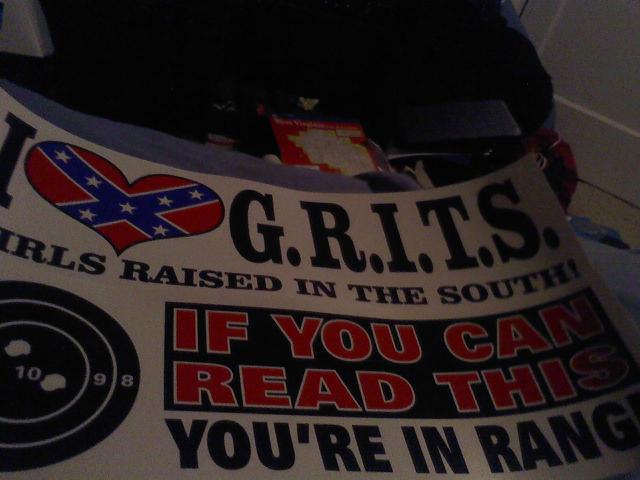 Sticker with text 'I love G.R.I.T.S. Girls Raised in the South!' and a confederate flag heart. Also text 'IF YOU CAN READ THIS YOU'RE IN DANGER'