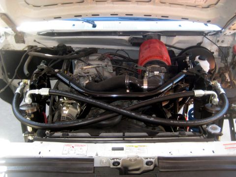 1996 Ford Bronco - Engine bay modifications are visible, including custom hoses and an aftermarket air filter.
