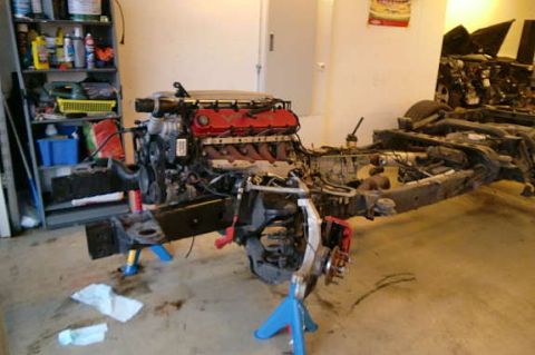 1972 Ford Ranchero - V10 engine and chassis assembly on jack stands, likely undergoing restoration or modification.