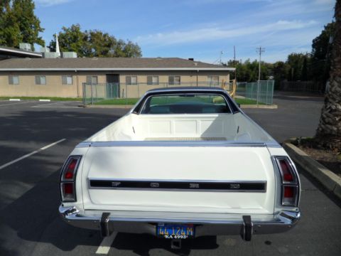 1973 Ford Ranchero - The rear of a white 1972 Ford Ranchero pickup truck is visible in a parking lot.