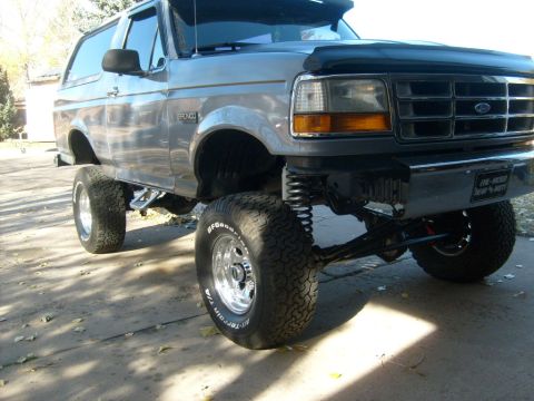 1986 Ford Bronco - Customized 1987 Ford Bronco with significant lift and off-road tires.