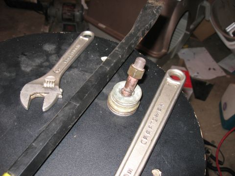 1981 Ford Bronco - Found a bolt that fit the thread on the end of the cam, and used a stack of washers to help press it on.