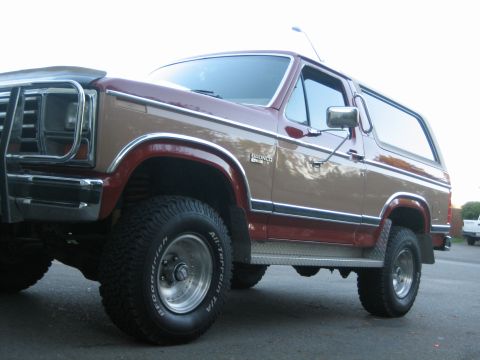 1984 Ford Bronco - This Ford Bronco displays a two-tone paint scheme and off-road tires.