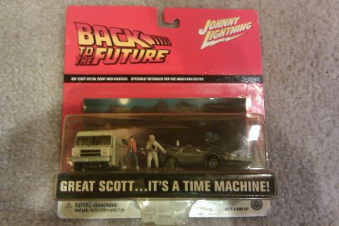 2010 Mitsubishi Outlander - This Johnny Lightning toy set depicts vehicles from the movie Back to the Future.