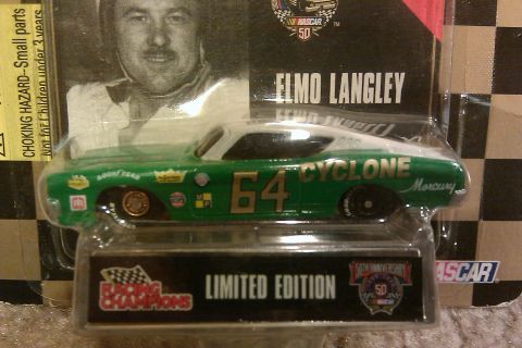 2010 Mitsubishi Outlander - A toy race car depicting Elmo Langley's Mercury Cyclone is shown in its packaging.