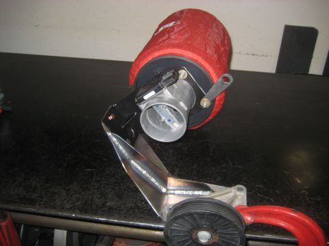1996 Ford Bronco - Custom air intake assembly with a red filter, throttle body, and a pulley system.