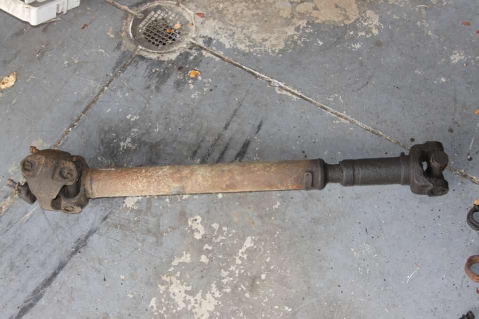 Driveshaft with U-joints on a concrete floor