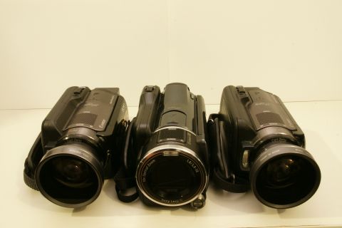 1993 Ford Taurus - A trio of Sony camcorders are displayed side-by-side against a plain background.