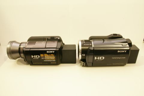 1993 Ford Taurus - Two Sony Handycam camcorders are displayed side-by-side against a white background.