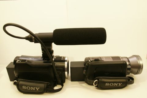 1993 Ford Taurus - Two Sony camcorders are displayed, one a directional microphone with a windscreen.