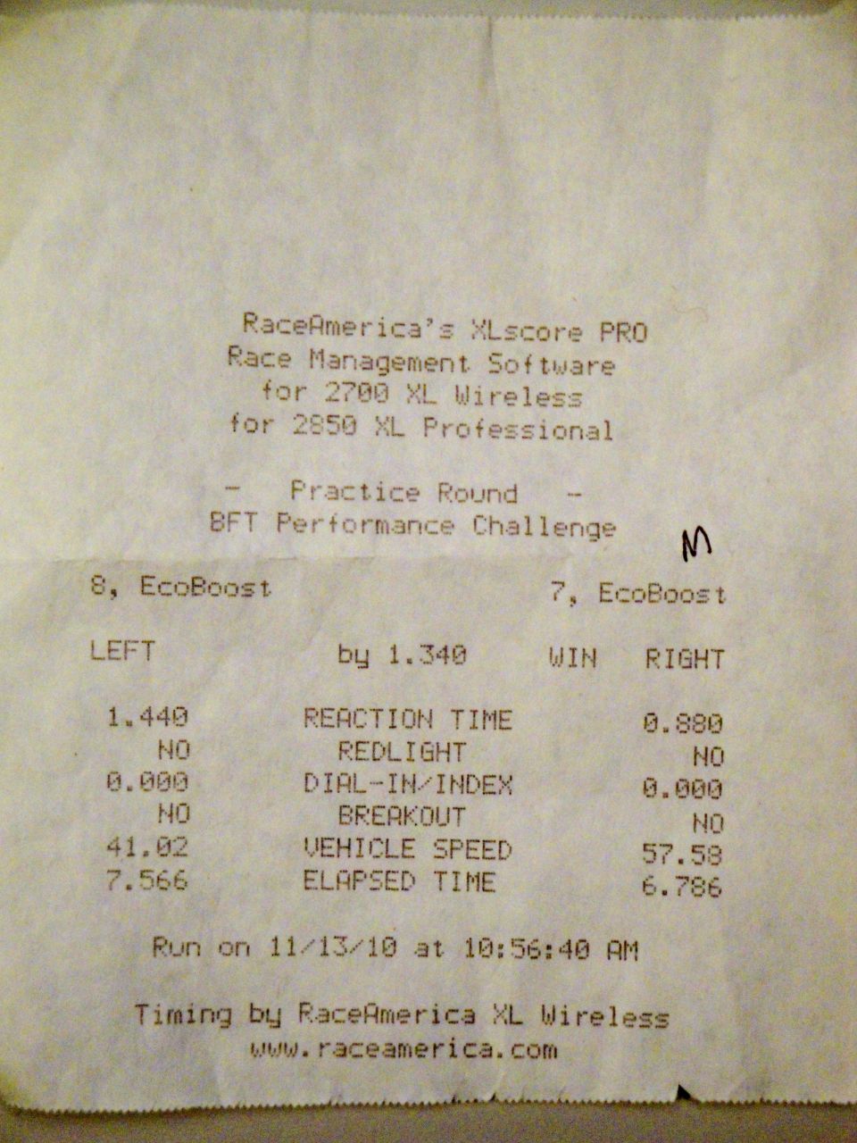Drag racing time slip showing reaction time, vehicle speed, and elapsed time for two EcoBoost entries