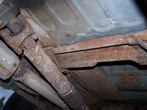 1996 Ford Bronco - Heavy rust is visible on the frame and drivetrain components of this vehicle.