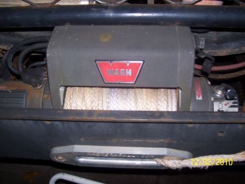 1978 Ford Bronco - A Warn winch is mounted to the vehicle's frame.