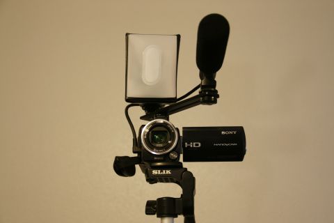1993 Ford Taurus - A Sony Handycam camcorder is shown with a microphone and a light diffuser attached.